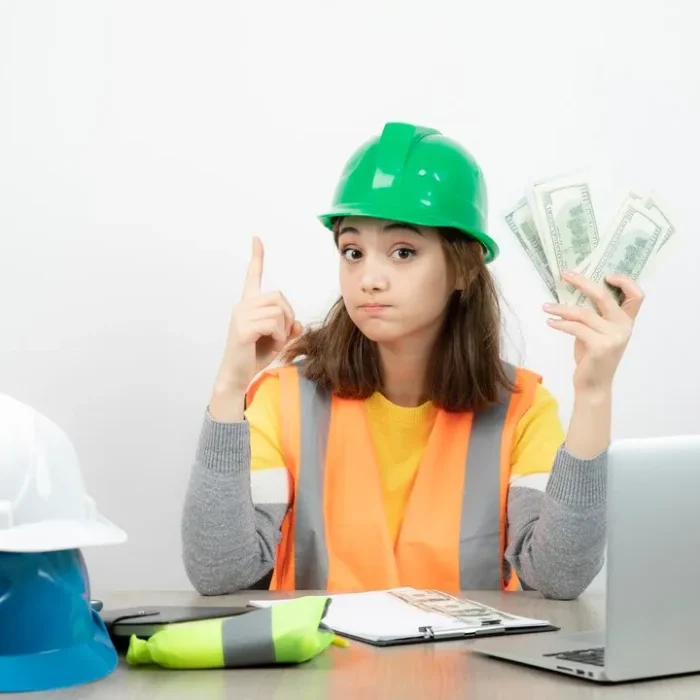 electricial-range-vest-green-helmet-sitting